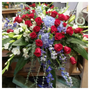Modern Red, White and Blue Casket Spray by Rosamungthorns