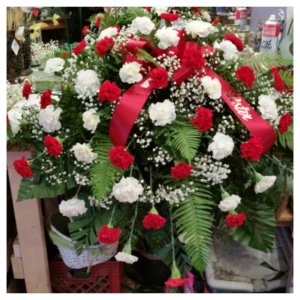 Red and white casket spray 